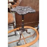 A George III dishtop tripod with 5 holders for hors douvre or oyster dishes perhaps, having