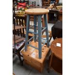 A pine bedside chest and a part painted beech stool