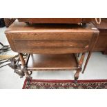 A mid 20th Century oak tea trolley, width approx. 68cm