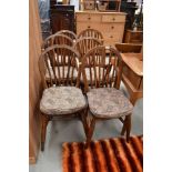 A set of six farm house kitchen chairs having hoop and stick back with yew or elm wood seats