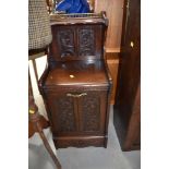 A Victorian mahogany coal purdonium