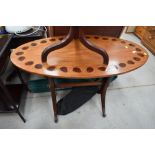 An interesting oval top table, having oyster wood inlay decoration, width approx. 107cm