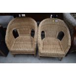 A pair of child's wicker tub chairs