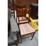 A pair of later Victorian/Edwardian mahogany bedroom chairs