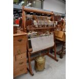 A pitch pine rug makers or fabric weavers loom with accessories