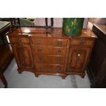 A reproduction yew wood, breakfront sideboard of small proportions, width approx. 104cm