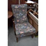 A vintage stained frame armchair