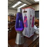 A modern retro styled large size lava lamp with pink purple hues