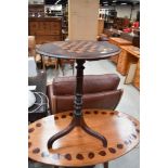 A Victorian oval occasional table having chequer board inlay to top, width approx. 51cm