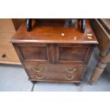 A 19th Century mahogany commode, designed as two drawer cabinet, width approx. 64cm