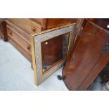 A large modern gilt framed mirror, approx 90 x 75cm