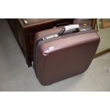 A Samsonite suitcase, mauve
