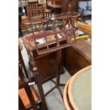 A hand made music or book stand in a red wood