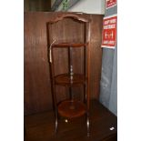 A collapsible Victorian cake stand in mahogany