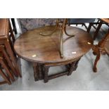 A traditional solid oak oval nest of tables, width of largest table approx. 80cm