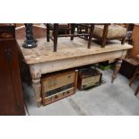 A Victorian pine narrow kitchen table