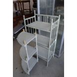 A selection of shabby chiq style shelf units in pale greens