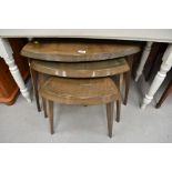 An interesting vintage stained frame nest of triangular tables