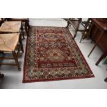 A modern wool rug, of traditional design, Royal Pavillion, approx. 120 x 180cm