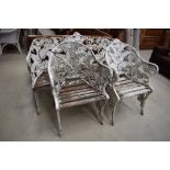 A cast aluminium three piece garden suite set, in the Coalbrookdale style, having fern pattern and