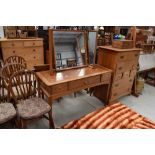 A drawer and dressing table set possibly by Stag in a satin wood