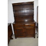 A traditional farm house style oak kitchen dresser or side board