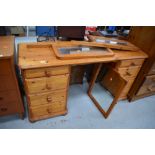 A modern pine twin pedestal dressing table having triptych mirror back, approx. width 138cm, would