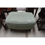 A reproduction upholstered footstool, width approx. 80cm