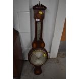 An Edwardian mahogany banjo aneroid barometer, having line and shell inlay decoration , broken