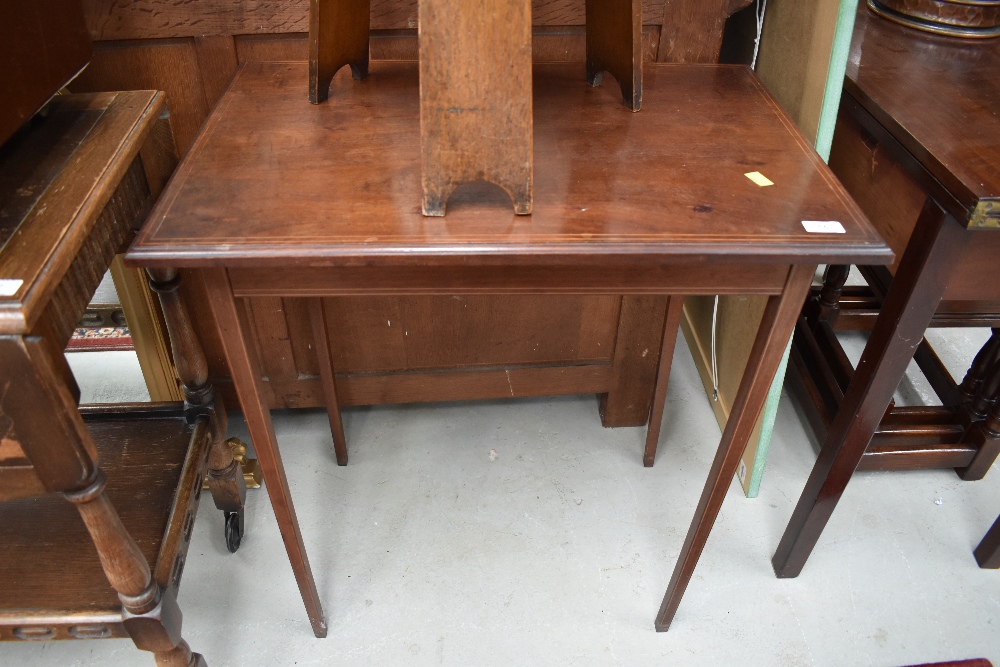 An Edwardian mahogany and inlaid occasional table on square tapered legs, width approx. 67cm