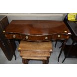 A reproduction mahogany and inlaid serpentine front side table, having triple frieze drawer, width