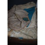 A box full of vintage curtains, pelmets, fabrics and similar.good condition.