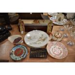 A selection of Chinese items including two soap stone figures two export plates and a cinnabar