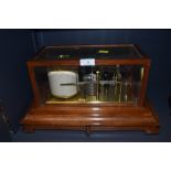 A vintage mahogany cased Negretti and Zambra model 4134 Barograph, having bevelled glass sides and