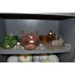 A selection of clear cut and colour glass dressing table sets including pink green and brown
