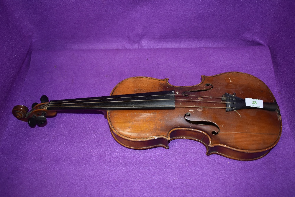 An early 20th century violin marked BW14 to back.