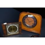 Two vintage wooden mantel clocks the large one being Smiths and having chiming mechanism.