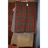 Four vintage 1950s and 1960s wool skirts and a dress, including Harris Tweed,all good condition,