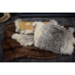 A vintage mink stole and two chinchilla pelts, all in very good condition.
