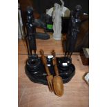 A selection of wood treen items including two tribal African figures and ebony dressing set