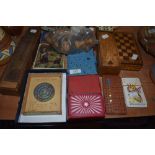 A selection of card games and puzzles including wooden chess set