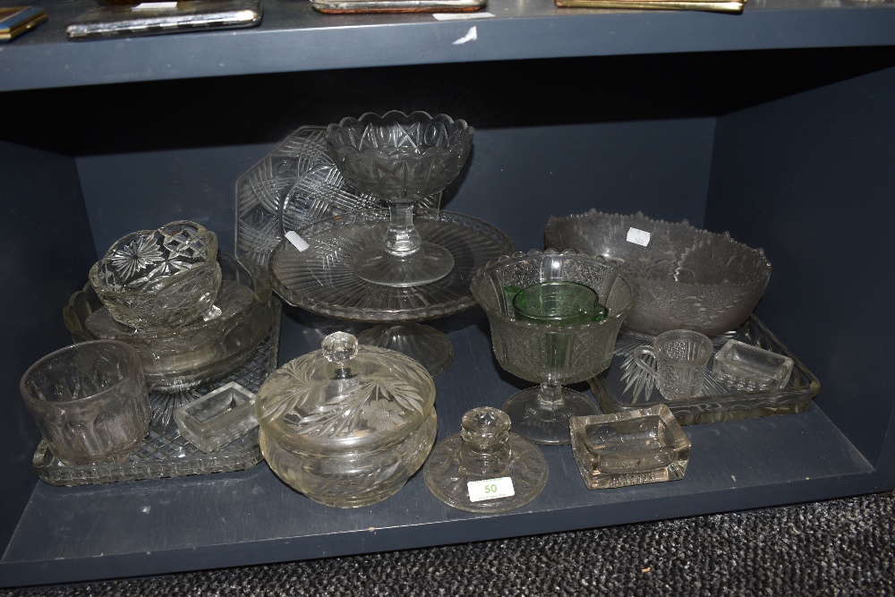 A collection of vintage pressed glass including dressing table sets, bowls and tazzas.