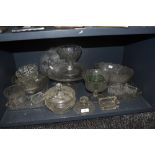 A collection of vintage pressed glass including dressing table sets, bowls and tazzas.