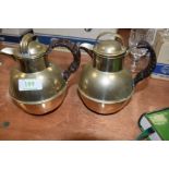 Two plated arts and crafts coffee pots,both hold a pint and have leather insulated handles, one