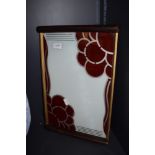 A glass and wooden handled Art deco tray having red floral design with gold accents.