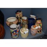 A selection of vintage vases and tankards and condiment jars, various styles and sizes.