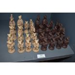 A set of chess pieces in the form of rats.