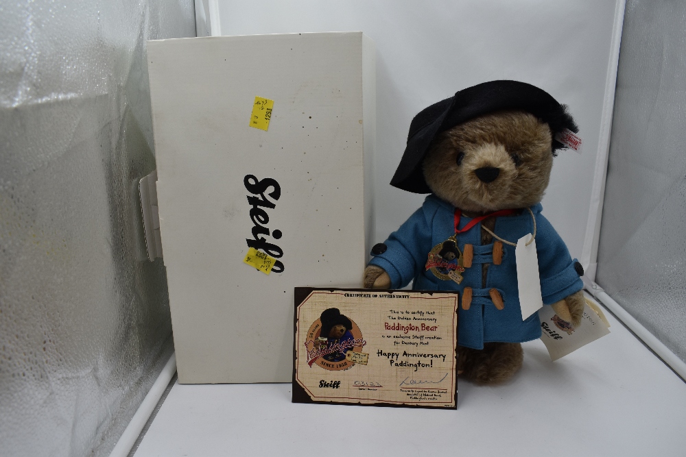 A Steiff Limited Edition 2008 Paddington Bear, wearing blue coat, black hat, medal and label, having