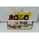 A 1:35 scale NZG Modelle diecast, JCB Articulated Loader 418 in original box 142