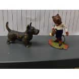 A vintage lead painted miniature figure of a Bear having sprung head with Trumpet along with a